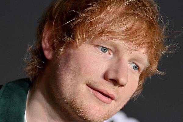 Ed Sheeran learns how to make Philly cheesesteak, then serves them to fans