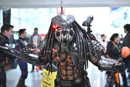 NEW YORK, NEW YORK - OCTOBER 14: A cosplayer poses as The Predator during New York Comic Con 2023 - Day 3 at Javits Center on October 14, 2023 in New York City. (Photo by Roy Rochlin/Getty Images for ReedPop)